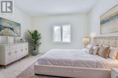 24 Cottonwood Street, Springwater, ON - Indoor Photo Showing Bedroom