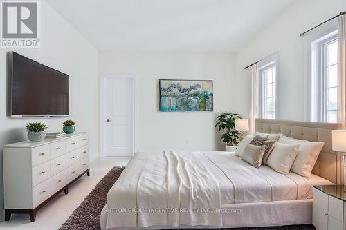 24 Cottonwood Street, Springwater, ON - Indoor Photo Showing Bedroom