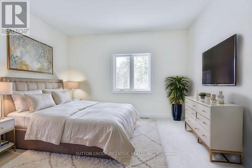 24 Cottonwood Street, Springwater, ON - Indoor Photo Showing Bedroom