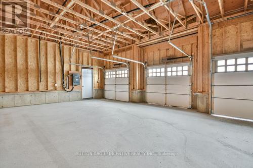 24 Cottonwood Street, Springwater, ON - Indoor Photo Showing Garage