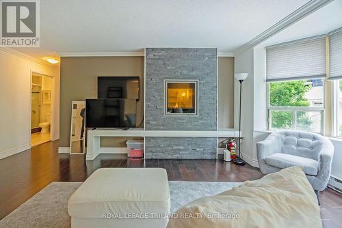 303 - 500 Talbot Street, London, ON - Indoor Photo Showing Living Room With Fireplace