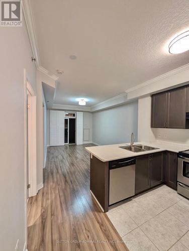 104 - 5317 Upper Middle Road, Burlington, ON - Indoor Photo Showing Kitchen With Double Sink