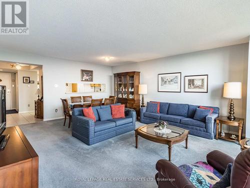 1002 - 320 Mill Street S, Brampton, ON - Indoor Photo Showing Living Room