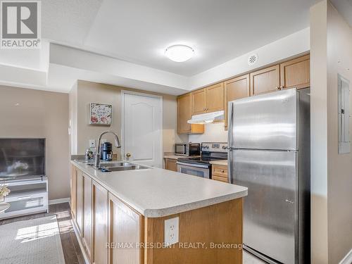 1 - 129 Isaac Devins Boulevard, Toronto, ON - Indoor Photo Showing Kitchen With Double Sink