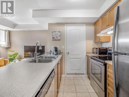 1 - 129 Isaac Devins Boulevard, Toronto, ON - Indoor Photo Showing Kitchen With Double Sink