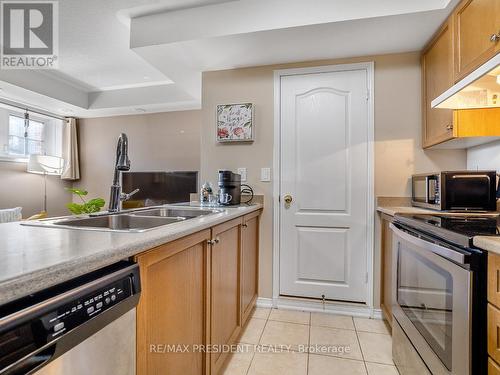 1 - 129 Isaac Devins Boulevard, Toronto, ON - Indoor Photo Showing Kitchen With Double Sink