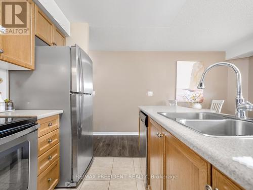 1 - 129 Isaac Devins Boulevard, Toronto, ON - Indoor Photo Showing Kitchen With Double Sink