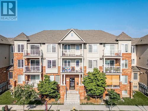 1 - 129 Isaac Devins Boulevard, Toronto, ON - Outdoor With Facade