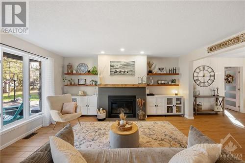 1316 Grand Chene Court, Ottawa, ON - Indoor Photo Showing Living Room With Fireplace