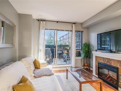 111-297 Hirst Ave West, Parksville, BC - Indoor Photo Showing Living Room With Fireplace