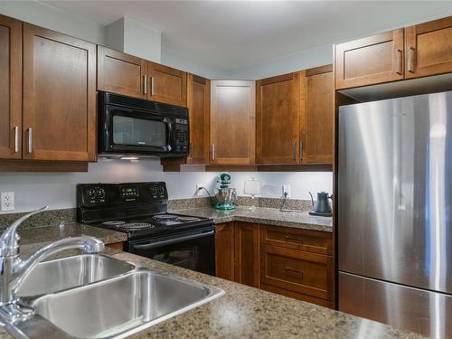 111-297 Hirst Ave West, Parksville, BC - Indoor Photo Showing Kitchen With Double Sink