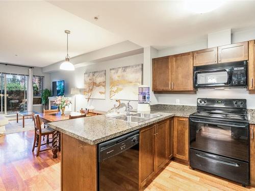 111-297 Hirst Ave West, Parksville, BC - Indoor Photo Showing Kitchen With Double Sink