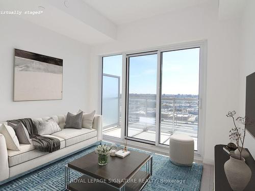 1911-2033 Kennedy Rd, Toronto, ON - Indoor Photo Showing Living Room