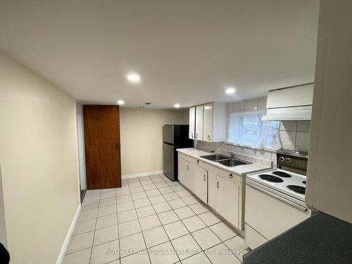 17 Alan Ave, Toronto, ON - Indoor Photo Showing Kitchen With Double Sink