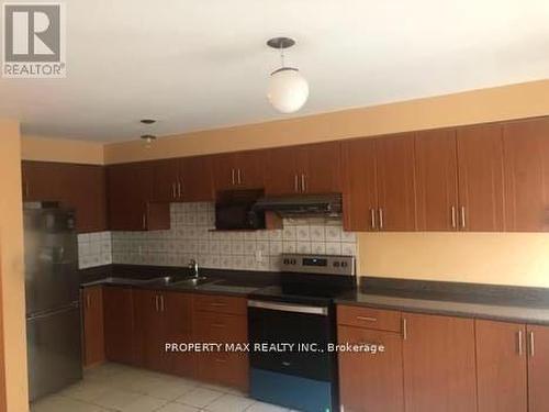 13 - 23 Rivers Edge Drive E, Toronto, ON - Indoor Photo Showing Kitchen With Double Sink