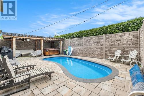 573 Apollo Way, Orleans, ON - Outdoor With In Ground Pool With Deck Patio Veranda