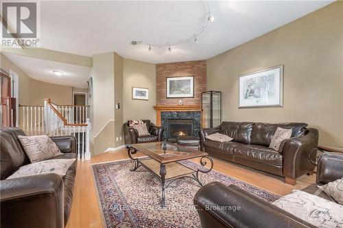 573 Apollo Way, Ottawa, ON - Indoor Photo Showing Living Room With Fireplace