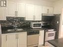 1010 - 20 Edgecliffe Golfway, Toronto, ON  - Indoor Photo Showing Kitchen With Double Sink 