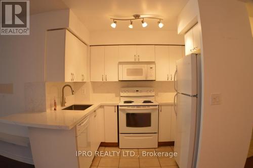 714 - 4090 Living Arts Drive, Mississauga, ON - Indoor Photo Showing Kitchen