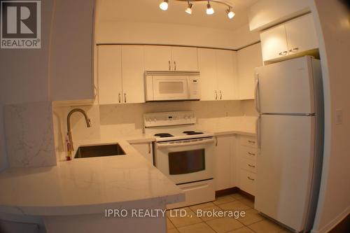 714 - 4090 Living Arts Drive, Mississauga, ON - Indoor Photo Showing Kitchen