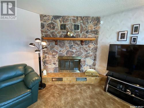 726 Main Street, Eston, SK - Indoor Photo Showing Living Room With Fireplace