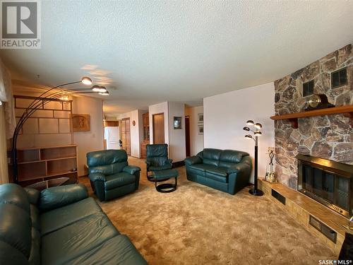 726 Main Street, Eston, SK - Indoor Photo Showing Living Room With Fireplace