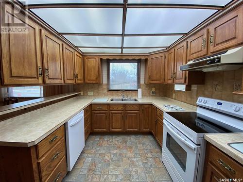 726 Main Street, Eston, SK - Indoor Photo Showing Kitchen With Double Sink