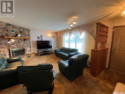 726 Main Street, Eston, SK - Indoor Photo Showing Living Room With Fireplace