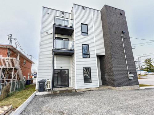 Back facade - 8114 Boul. Lévesque E., Laval (Saint-François), QC - Outdoor With Balcony