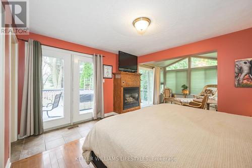 217 Centennial Avenue, St. Thomas, ON - Indoor Photo Showing Bedroom With Fireplace