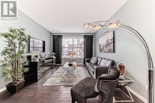 703, 10 Auburn Bay Avenue Se, Calgary, AB - Indoor Photo Showing Living Room