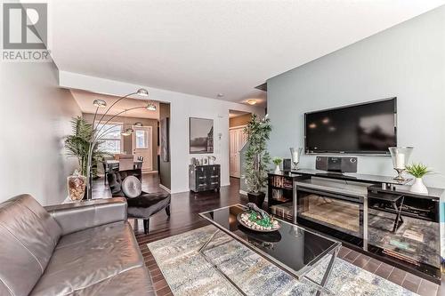 703, 10 Auburn Bay Avenue Se, Calgary, AB - Indoor Photo Showing Living Room