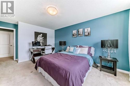 703, 10 Auburn Bay Avenue Se, Calgary, AB - Indoor Photo Showing Bedroom