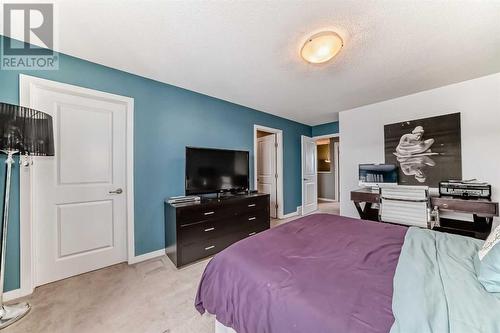 703, 10 Auburn Bay Avenue Se, Calgary, AB - Indoor Photo Showing Bedroom