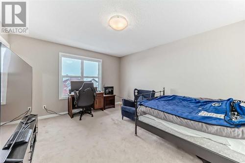 703, 10 Auburn Bay Avenue Se, Calgary, AB - Indoor Photo Showing Bedroom