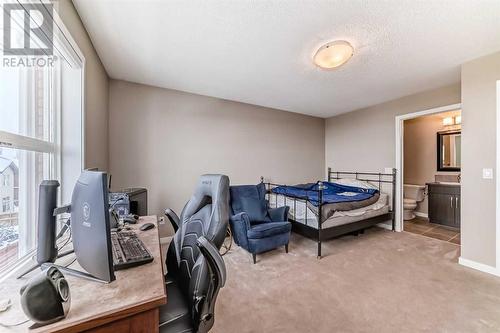 703, 10 Auburn Bay Avenue Se, Calgary, AB - Indoor Photo Showing Bedroom