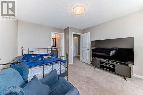 703, 10 Auburn Bay Avenue Se, Calgary, AB - Indoor Photo Showing Bedroom