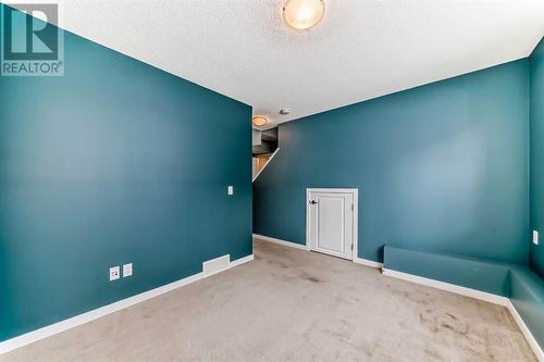 703, 10 Auburn Bay Avenue Se, Calgary, AB - Indoor Photo Showing Other Room