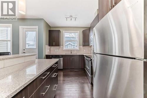 703, 10 Auburn Bay Avenue Se, Calgary, AB - Indoor Photo Showing Kitchen With Stainless Steel Kitchen With Upgraded Kitchen