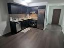 2006-255 Village Green Sq, Toronto, ON  - Indoor Photo Showing Kitchen With Double Sink 