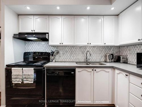 524-5233 Dundas St W, Toronto, ON - Indoor Photo Showing Kitchen With Double Sink