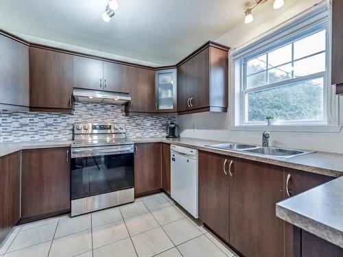 Kitchen - 402 Rue Des Colibris, Ange-Gardien, QC - Indoor Photo Showing Kitchen With Double Sink