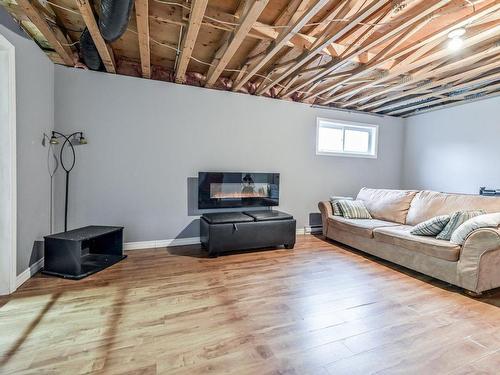 Family room - 402 Rue Des Colibris, Ange-Gardien, QC - Indoor Photo Showing Basement