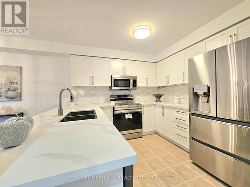 56 Catkins Crescent, Whitby, ON - Indoor Photo Showing Kitchen With Double Sink With Upgraded Kitchen