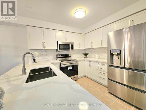 56 Catkins Crescent, Whitby, ON - Indoor Photo Showing Kitchen With Double Sink