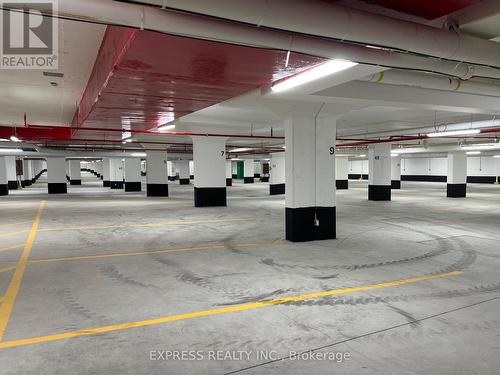 313 - 2545 Simcoe Street N, Oshawa, ON - Indoor Photo Showing Garage