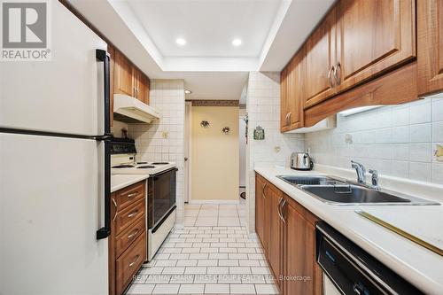 411 - 360 Watson Street W, Whitby (Port Whitby), ON - Indoor Photo Showing Kitchen With Double Sink