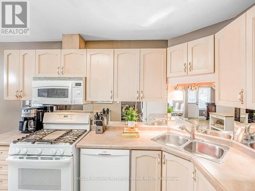 1166 Upper Wentworth Street E, Hamilton, ON - Indoor Photo Showing Kitchen With Double Sink