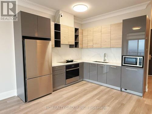 Ph02 - 38 Gandhi Lane, Markham, ON - Indoor Photo Showing Kitchen With Double Sink