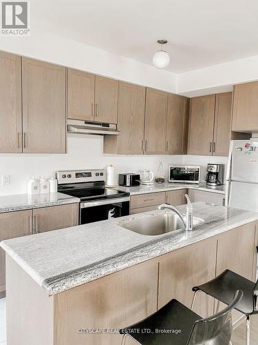 3038 Islington Avenue, Toronto, ON - Indoor Photo Showing Kitchen With Double Sink